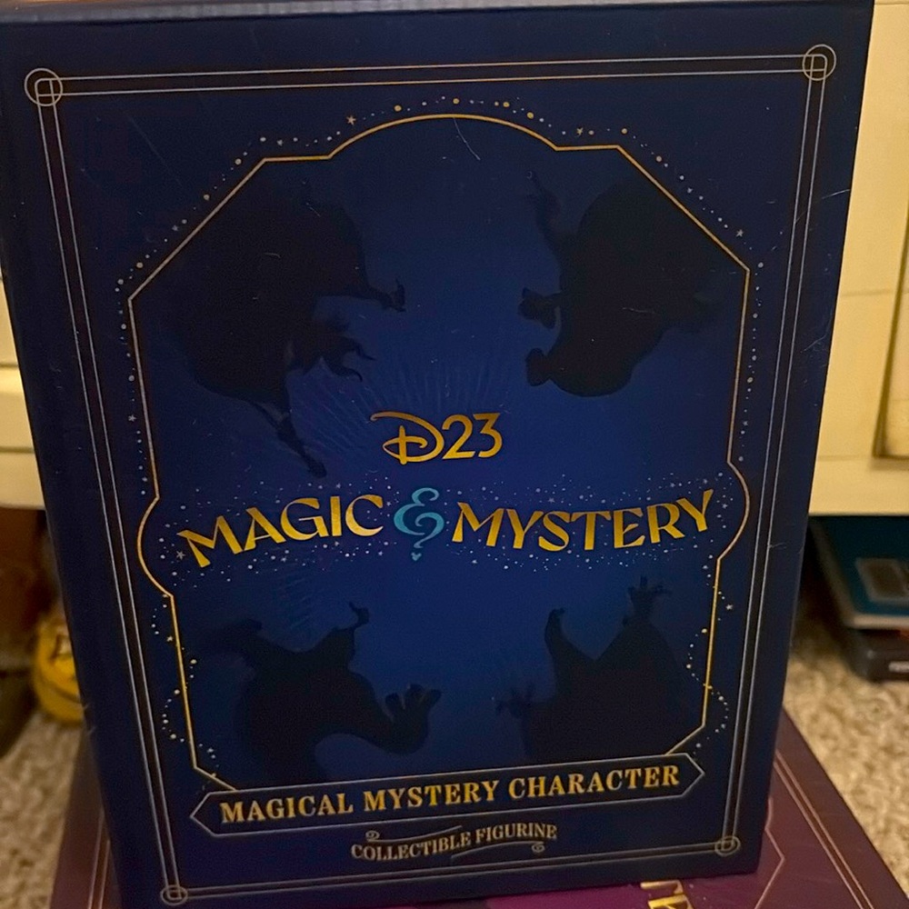 D23 Merlin figurine